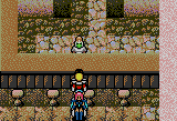 Gyuna behind the counter of his inn